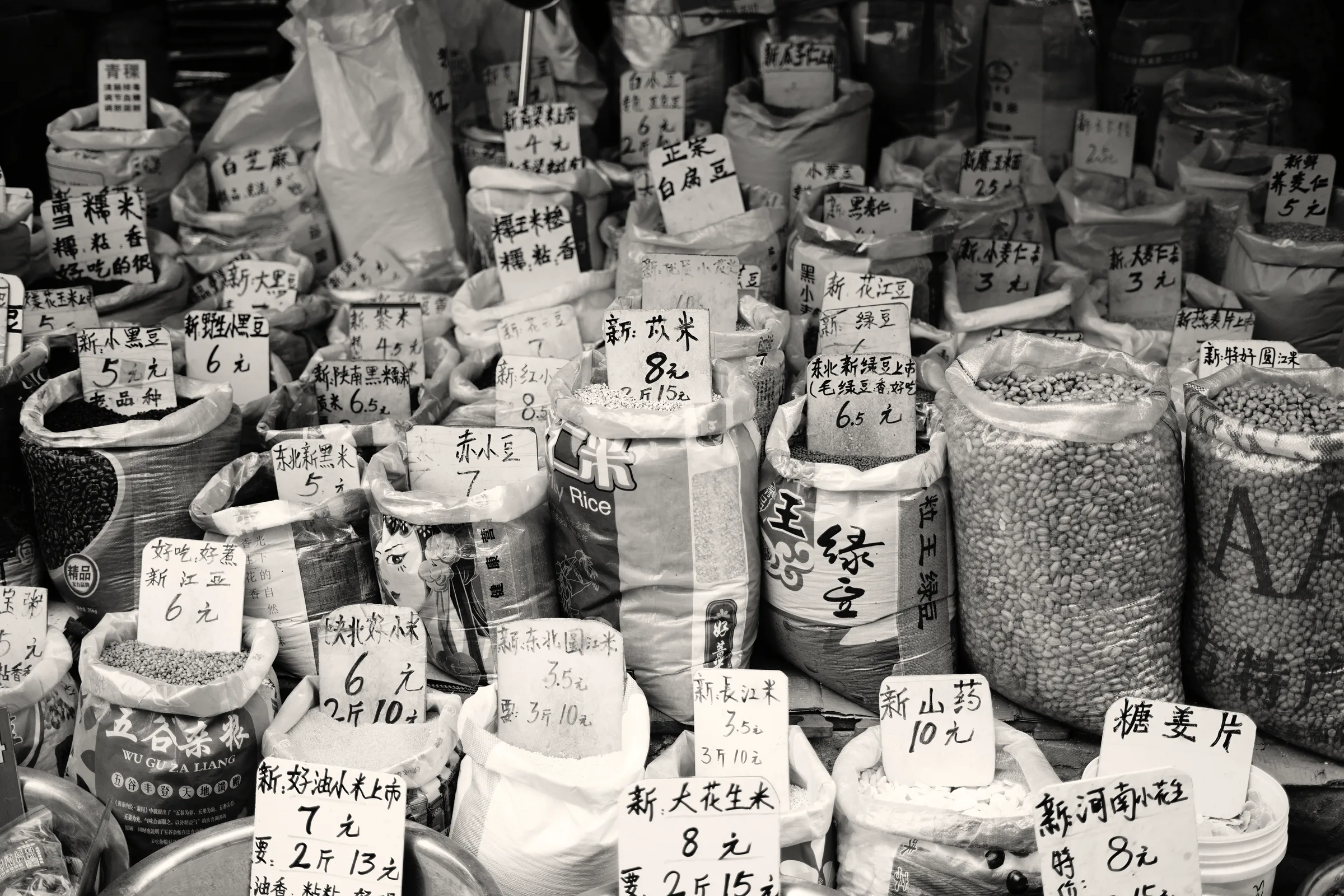 Sacks of spices and dried chillies at a market stall